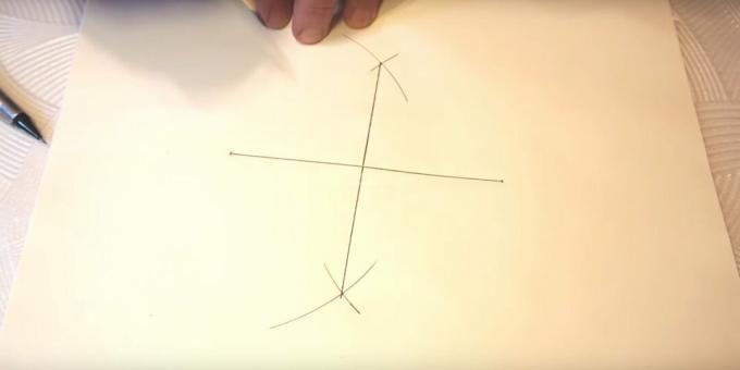 Cómo dibujar una estrella de cinco puntas: dibuja una línea vertical