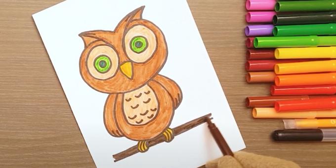 Cómo dibujar un búho: pintar sobre los ojos, las piernas y una rama.