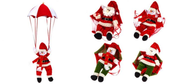 Santa Claus y un muñeco de nieve en un paracaídas