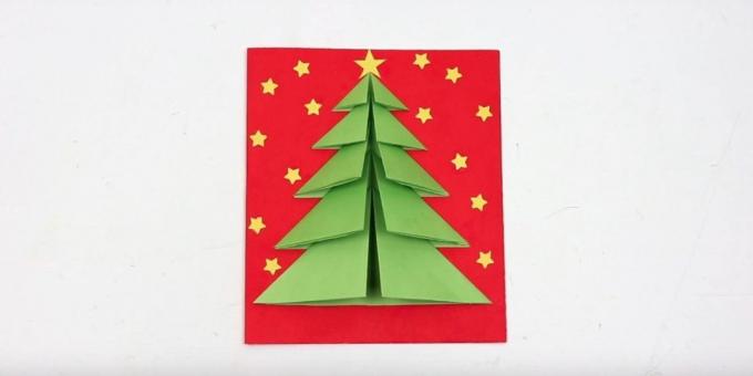 Tarjeta de Navidad con el árbol de Navidad en la portada del volumen